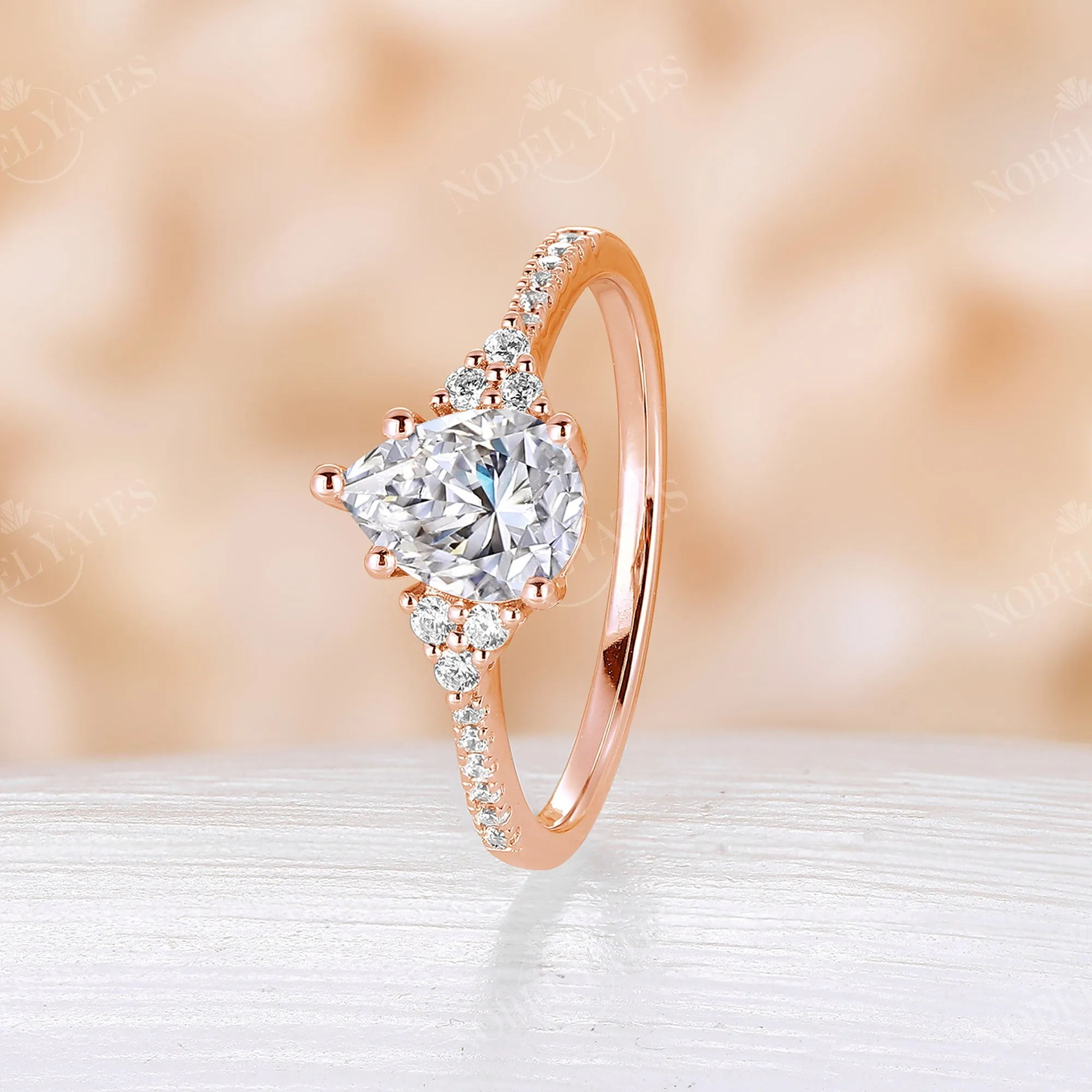 Vintage Pear Moissanite Rose Gold Pave & Cluster Engagement Ring